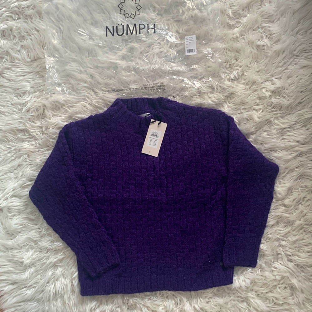 Purple sweater.